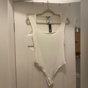 Fashion Nova Cream Sleeveless Bodysuit